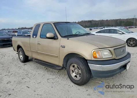 1999 Ford F150 z USA, uszkodzony, nr VIN 1FTZX1727XNA71404